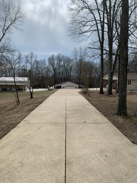 Concrete Cleaning for Driveways: Oil Stains, Rust Stains, and Organic Growth—What Works Best?